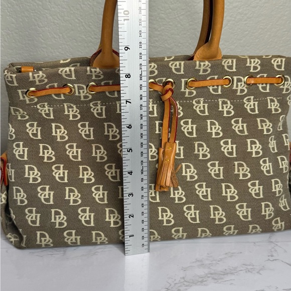 Dooney & Bourke Taupe Monogrammed Jacquard Tan Leather Trim Tassel Tote Handbag - Picture 9 of 11